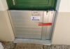 batardeau sedipec devant une porte d'entrée