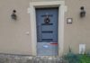 batardeau devant une porte d'entrée