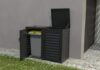 Types d'abris pour poubelles en aluminium double avec ouverture frontale et couvercle, installé sur une terrasse extérieure